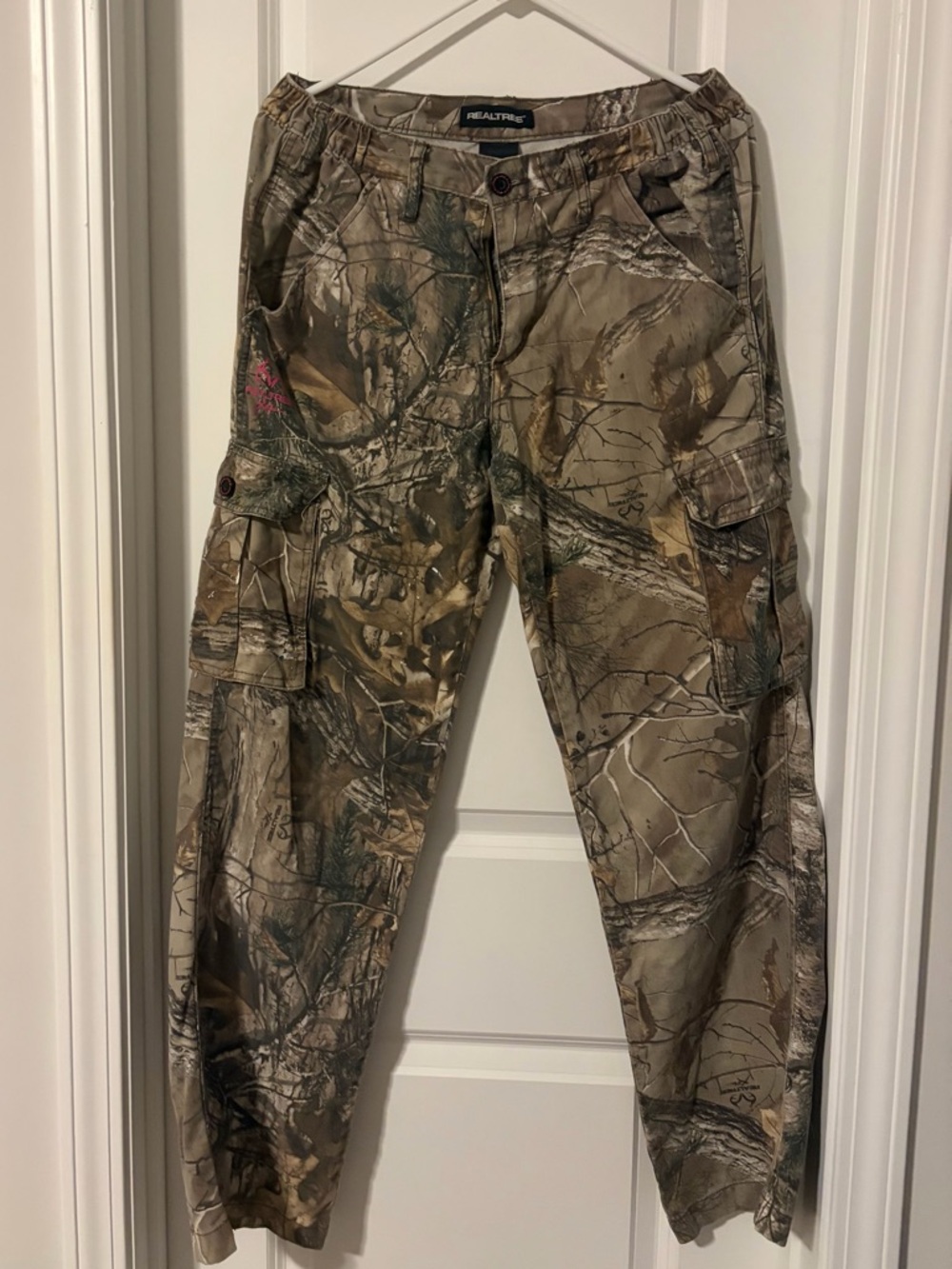 Realtree womens Camo Cargo Pants 
Size M
Several small white paint spots